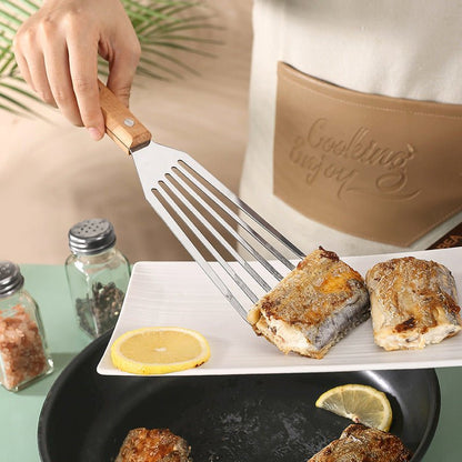 Spatule en acier inoxydable, type papillon, avec manche en bois. - cuizinezen