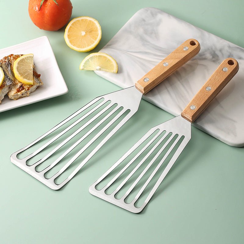 Spatule en acier inoxydable, type papillon, avec manche en bois. - cuizinezen