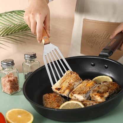 Spatule en acier inoxydable, type papillon, avec manche en bois. - cuizinezen